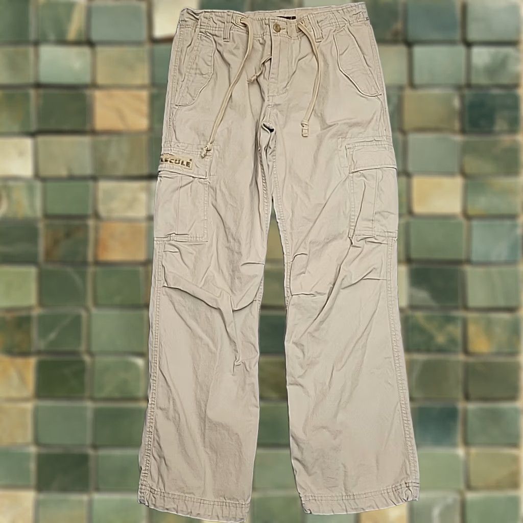 Vintage VTG Molecule Cargo pants Mens L 34x32 Khaki Military Wide Leg Skate Streetwear Pants Mens L Khaki 90s Army Outdoor Canvas Pocket Zipper Batwing? Size US 33 - 1 Thumbnail