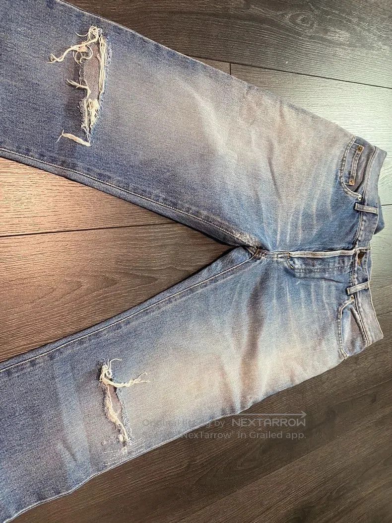 Saint Laurent Distressed Denim Jeans.