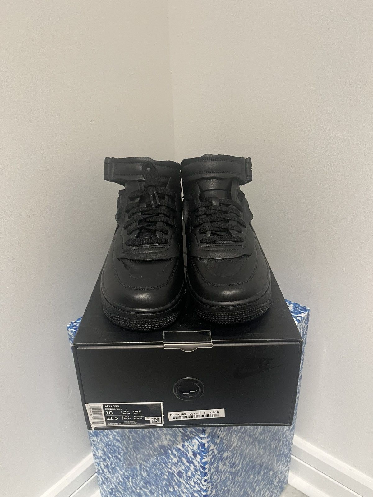image of Comme Des Garcons Homme Plus x Nike Air Force 1 Mid X Comme Des Garçons Homme Plus Shoes in Black (