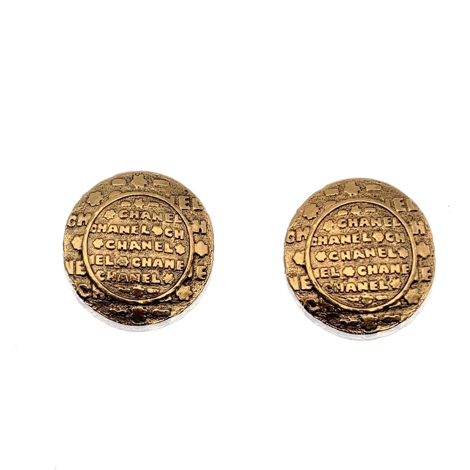image of Chanel Vintage Gold Metal Round Embossed Clip On Earrings, Women's