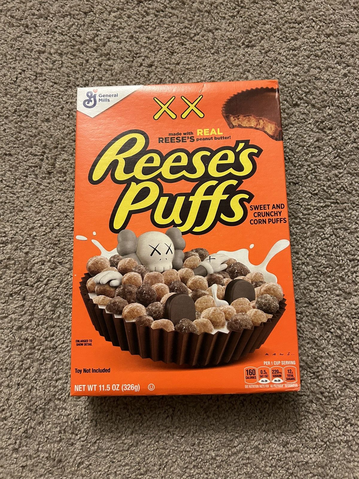 Designer × Kaws KAWS x Reese's Puffs Cereal | Grailed