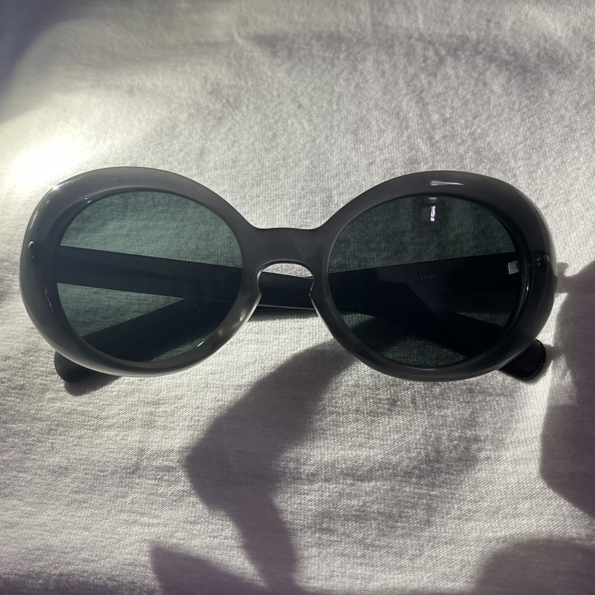 Number (N)ine KURT COBAIN OVAL SHAPE SUNGLASSES (SMOKE GREY) Size ONE SIZE - 1 Thumbnail