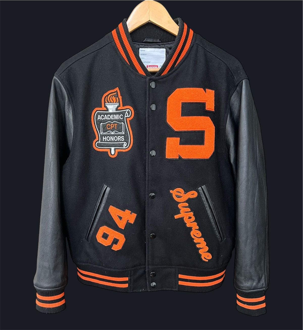 Supreme Supreme team varsity jacket black orange | Grailed