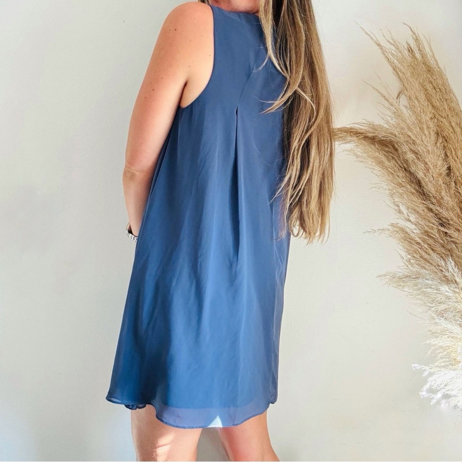 bcbg mini dress Wrapped Done in a sleeveless Bubble Mini Dress Jasmine /