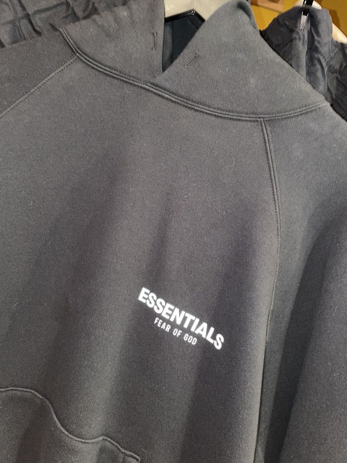 image of Fear Of God Essentials Core Collection Pullover Hoodie in Black, Men's (Size Small)