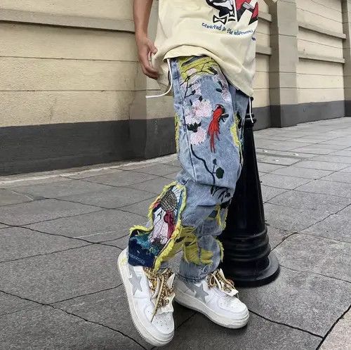 image of Distressed Denim x Jean Embroidered Patch Denim Ripped Jeans in Blue, Men's (Size 32)