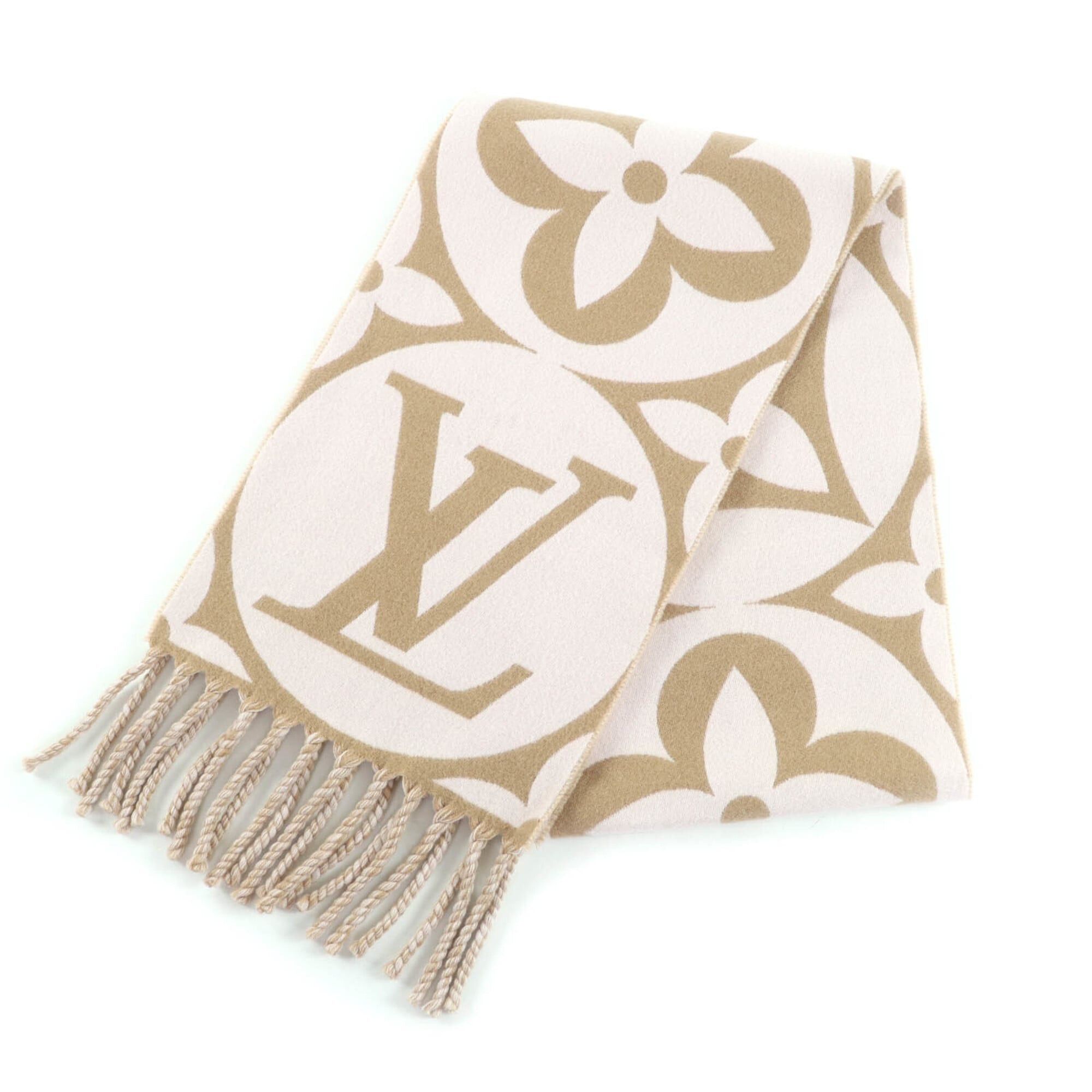 Louis Vuitton LOUIS VUITTON M79213 Flight Mode Scarf, 2024 model. LV medallion wool, beige/rose color. Current model with fringe. Comes original box. Made in Italy. Authentic. Women's item. Size ONE SIZE - 1 Thumbnail