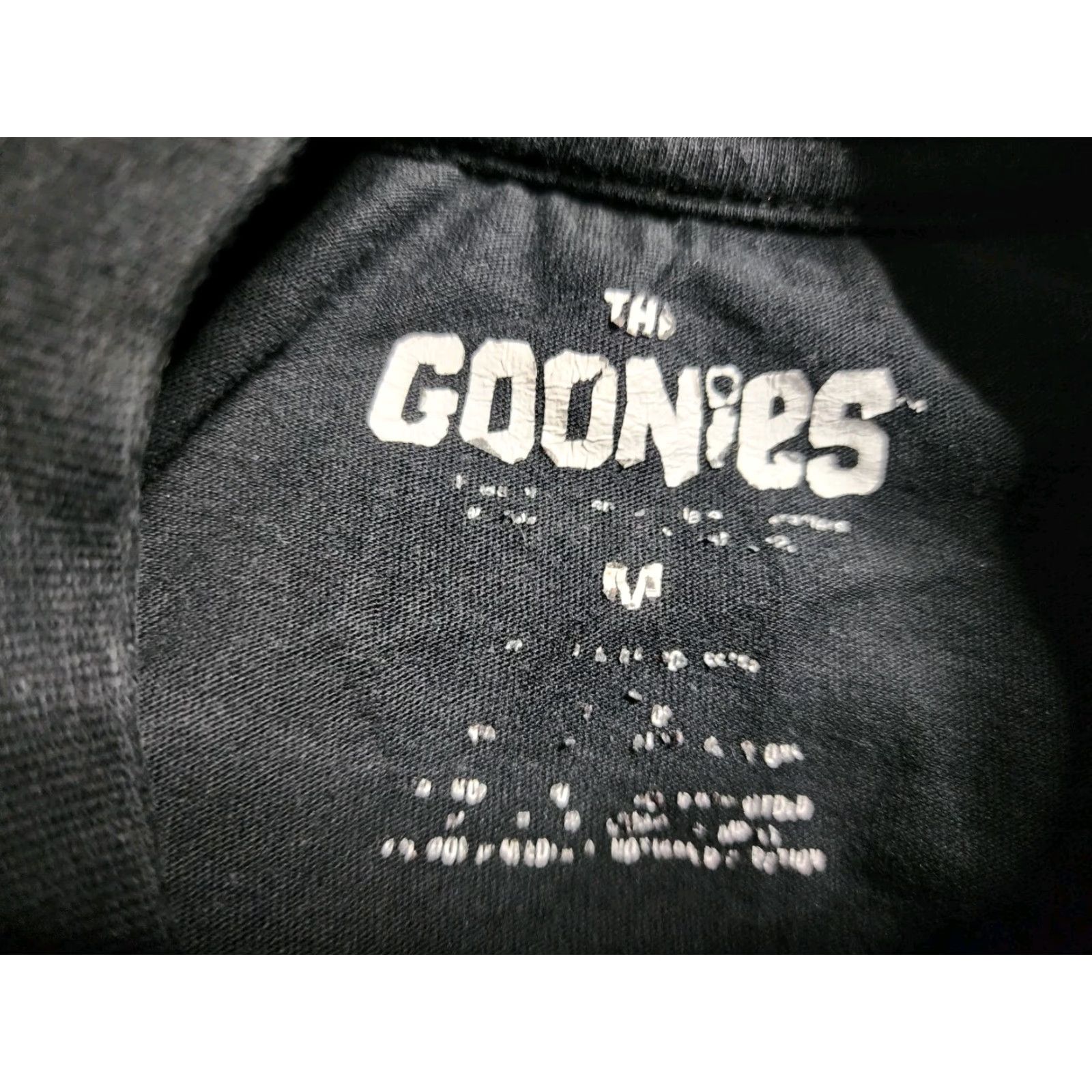 Vintage The Goonies T-Shirt Mens M Black Cotton Polyester Crew Neck Short Sleeve Graphic Print The Goonies Skull One-Eyed Willies Stolen Treasure Vintage No Size US M / EU 48-50 / 2 - 4 Thumbnail