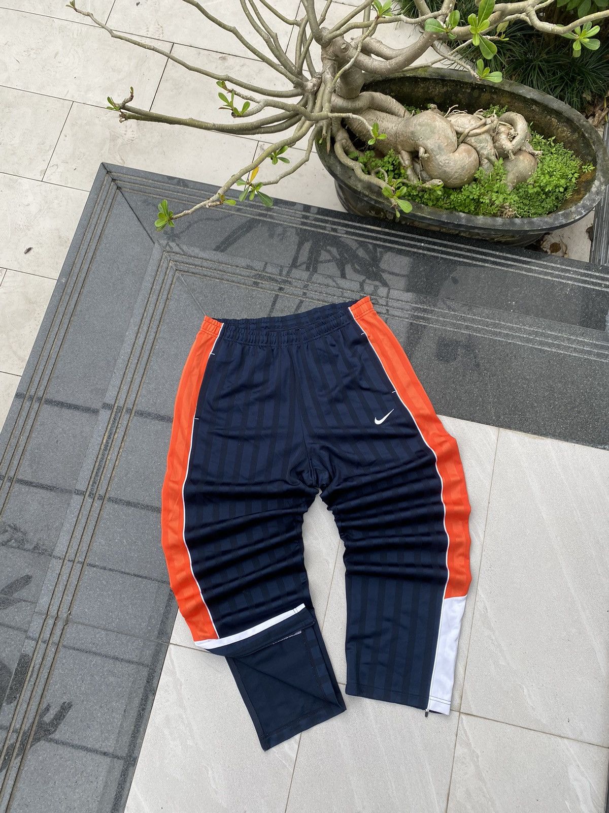 Nike × Vintage 90’s NIKE RARE LOGO Y2K RETRO SWOOSH ZIP NYLON SWEATPANTS Size US 34 / EU 50 - 1 Thumbnail