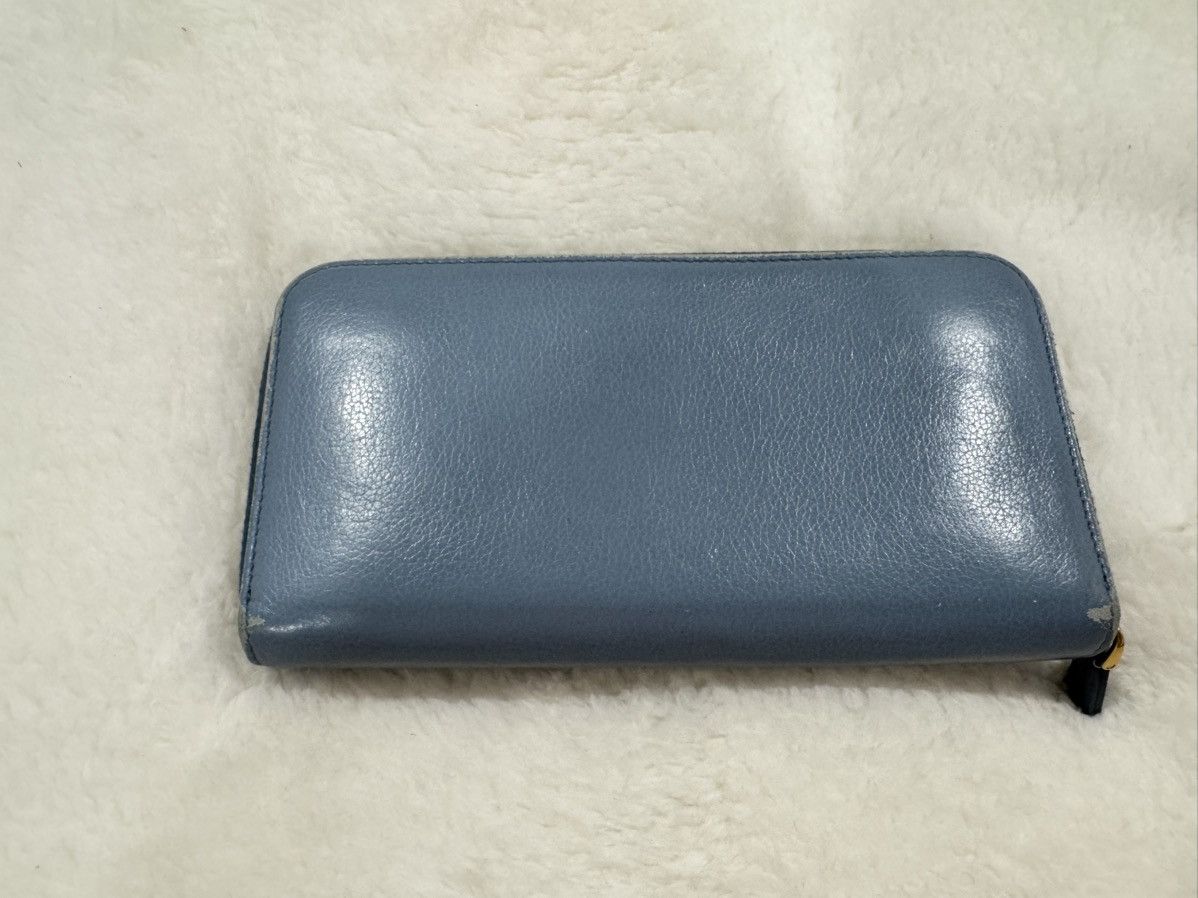 Prada light blue zippy wallet Womenswear