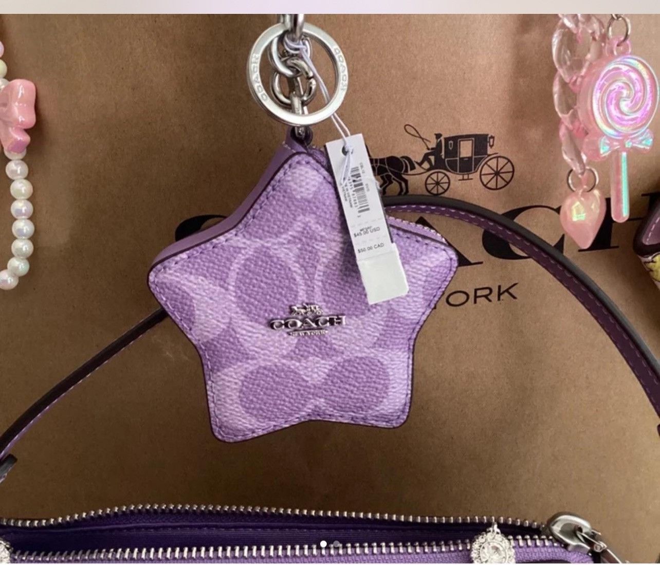 ❤️❤️COACH Purple IRIS BAG CHARM with gift receipt