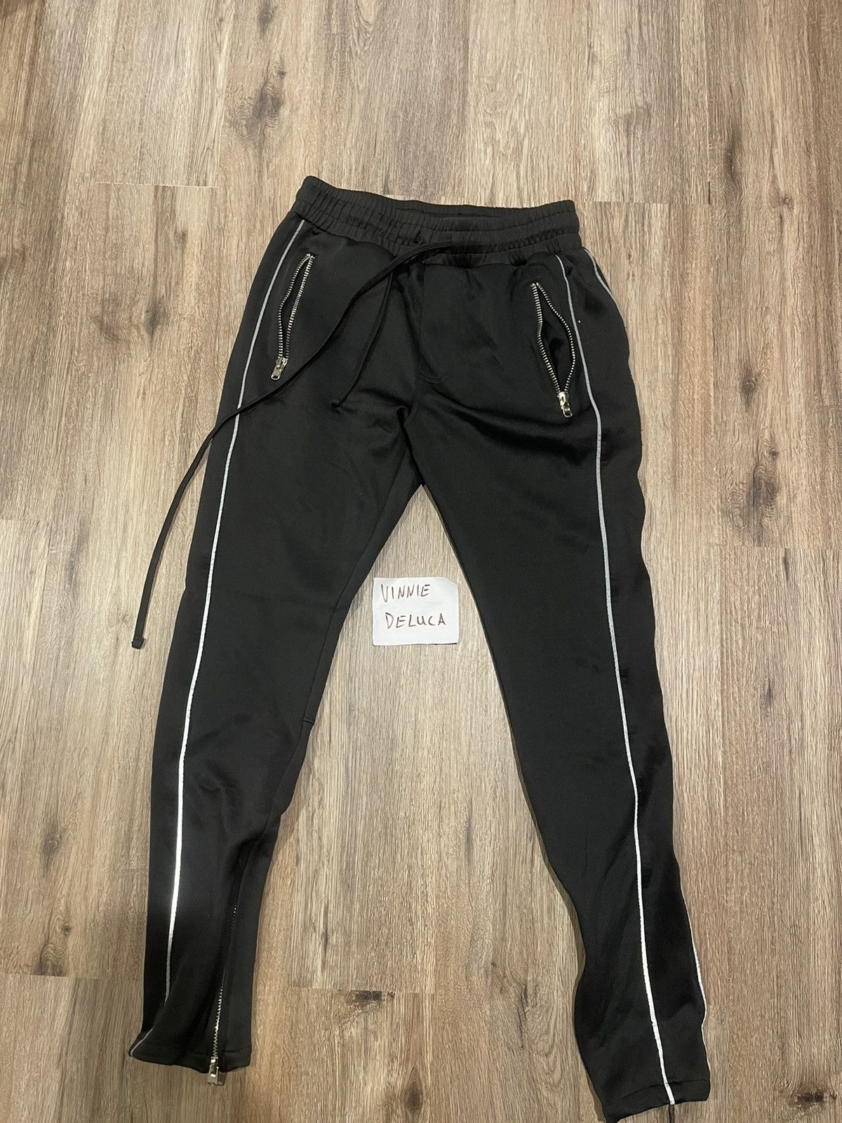 Mnml reflective track pants online