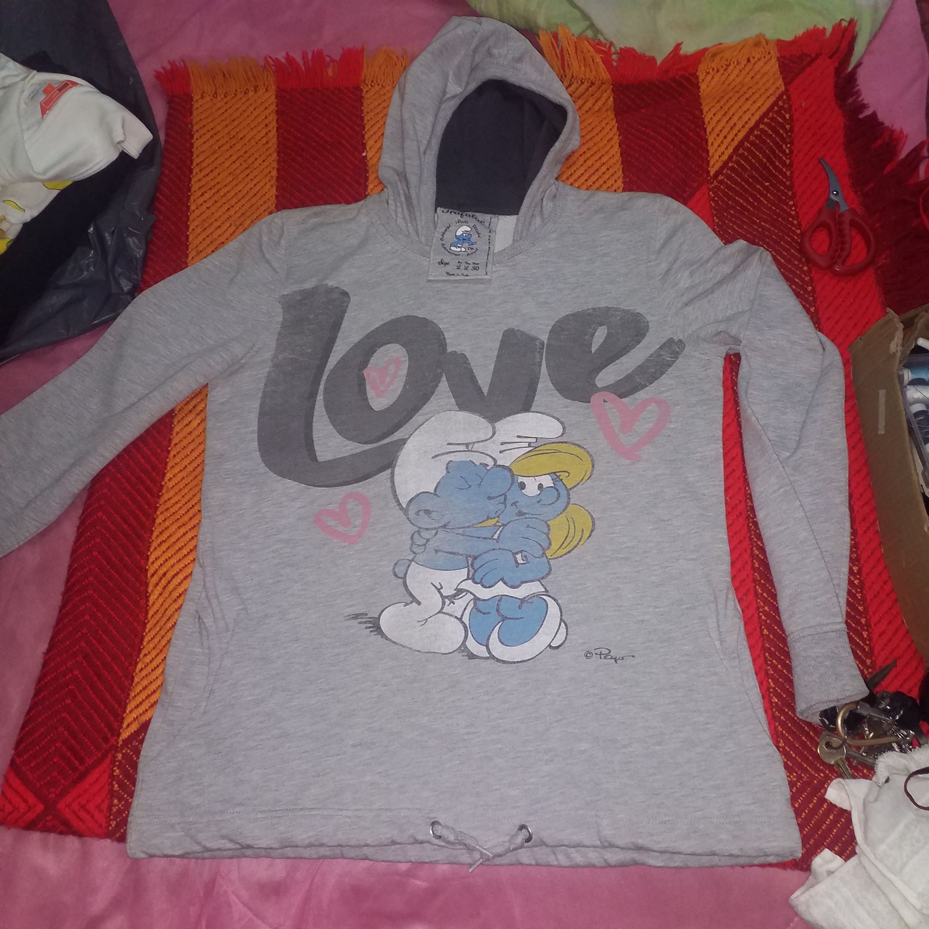 Cartoon Network × Vintage SMURF IN LOVING CARE UR PARTNER 😘😘😘 Size L / US 10 / IT 46 - 1 Thumbnail