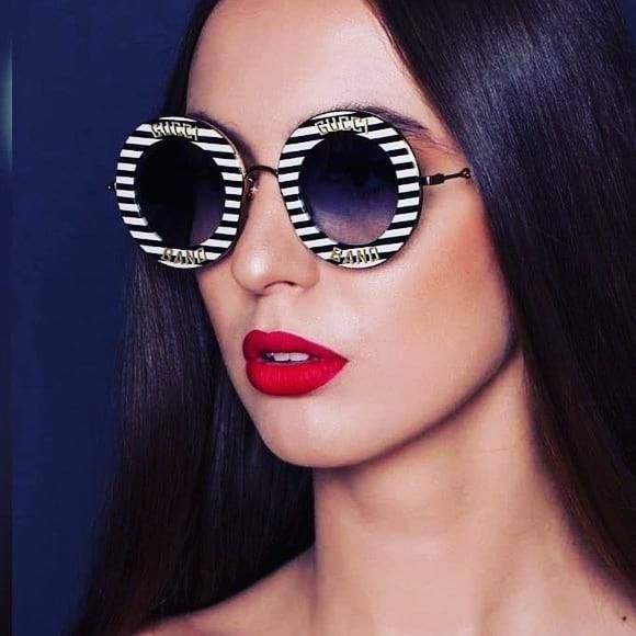 Gucci Gucci GG0113S 008 Sunglasses Black Round Frame, Blue Size ONE SIZE - 1 Thumbnail