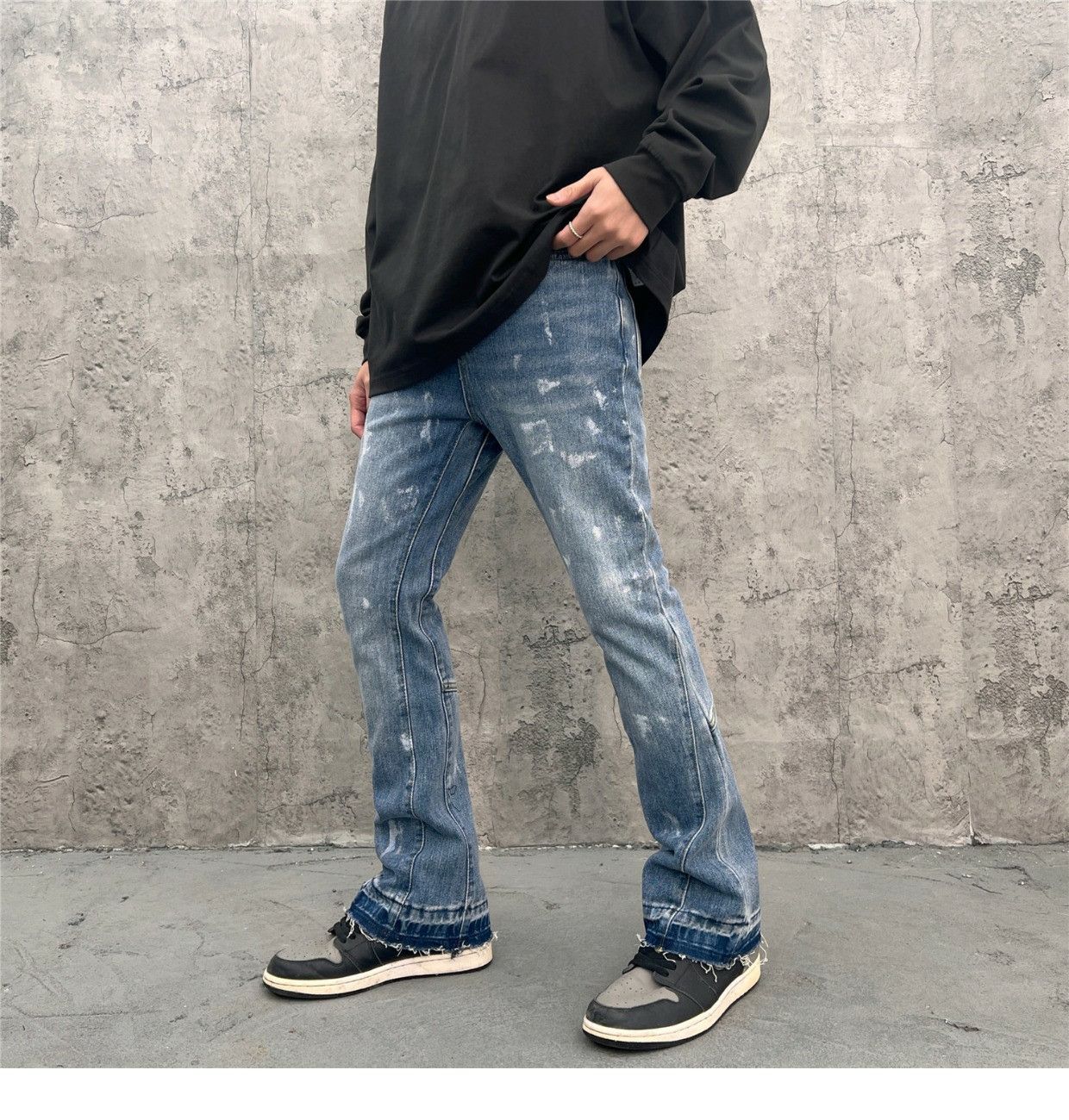 damaged faded paint flared jeans