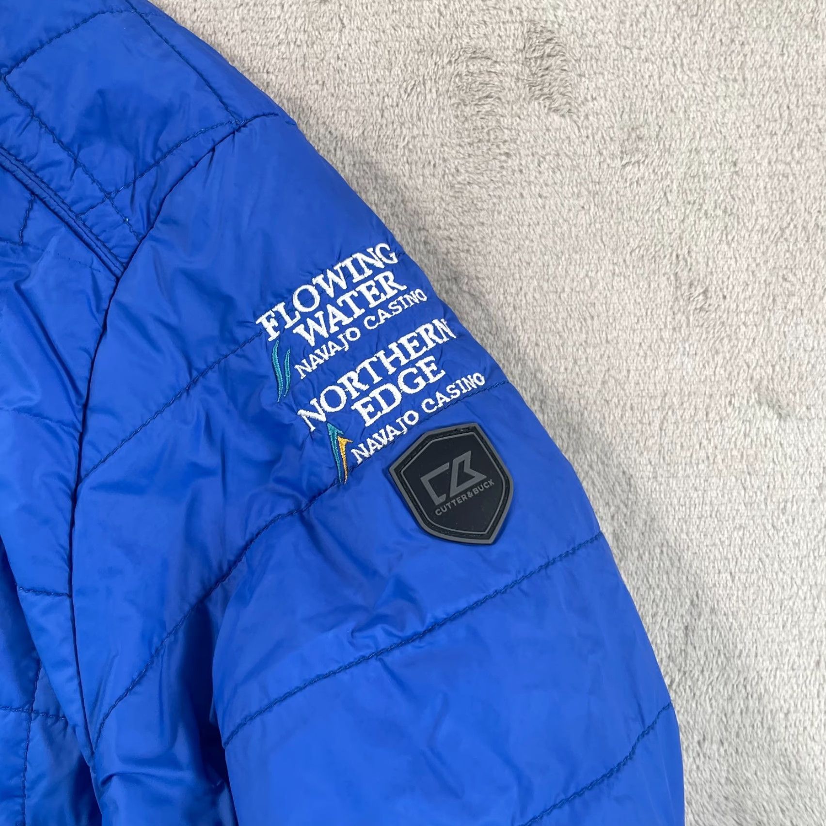 Cutter & Buck Cutter & Buck x Navajo Nation Gamin Casino Jacket Men 3XT Tall Blue WeatherTec Jacket Windbreaker Casual Travel Nebraska Football Logo #3XtTall? Size US XXL / EU 58 / 5 - 5 Thumbnail