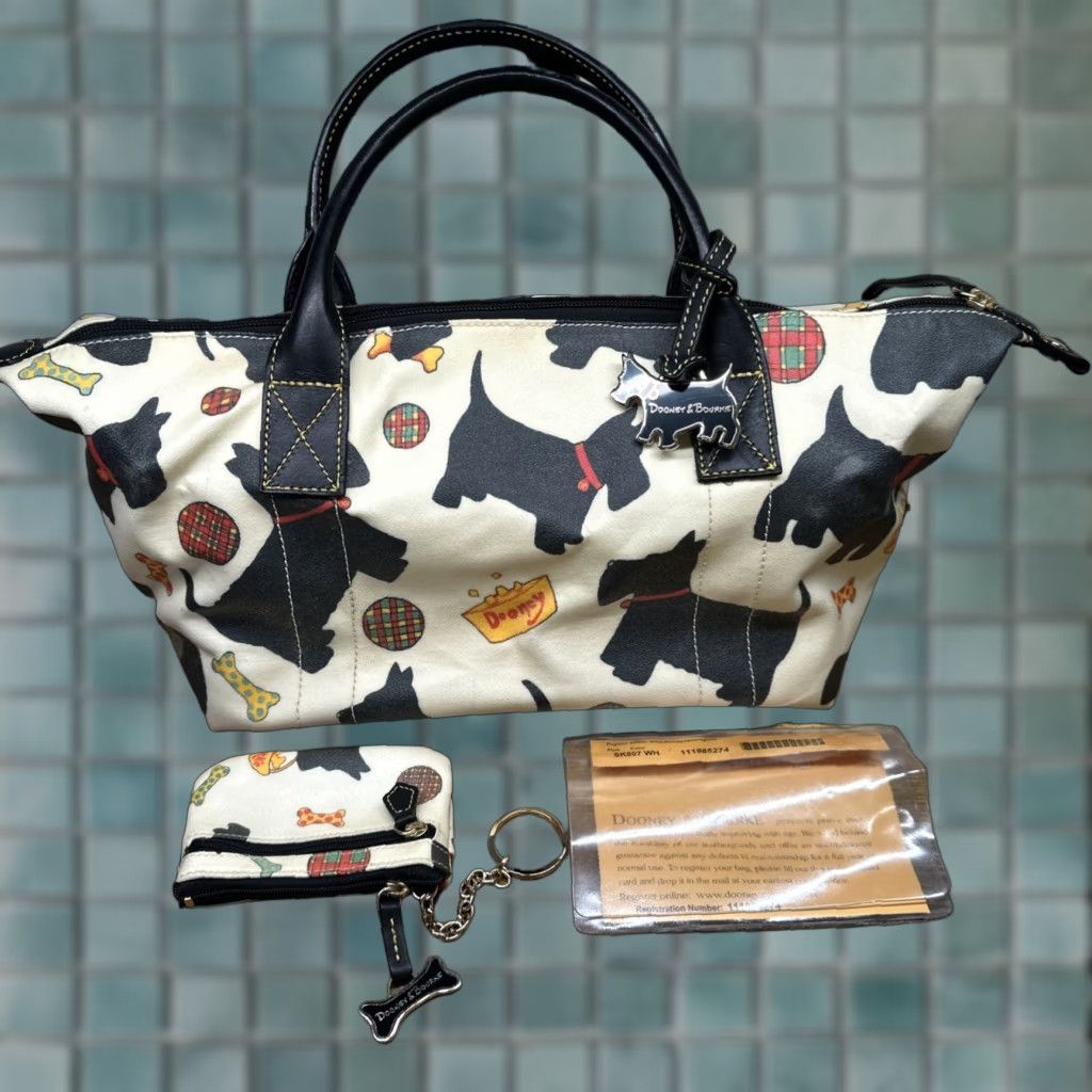 Dooney & Bourke Dooney & Bourke Scottie Dog Tote Duffle Bag Coated Canvas White Black Gold Hardware Wallet Medium Womens Bag Charm Zip Closure Size M / US 6-8 / IT 42-44 - 1 Thumbnail