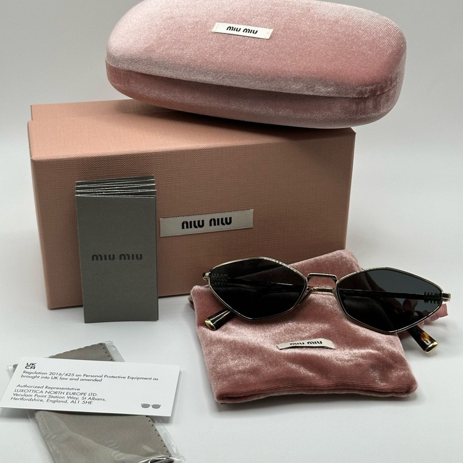 小物 MIU MIU sunglasses NEW MIU MIU MU56ZS ZVN5S0 Pale Gold Dark Grey Sunglasses