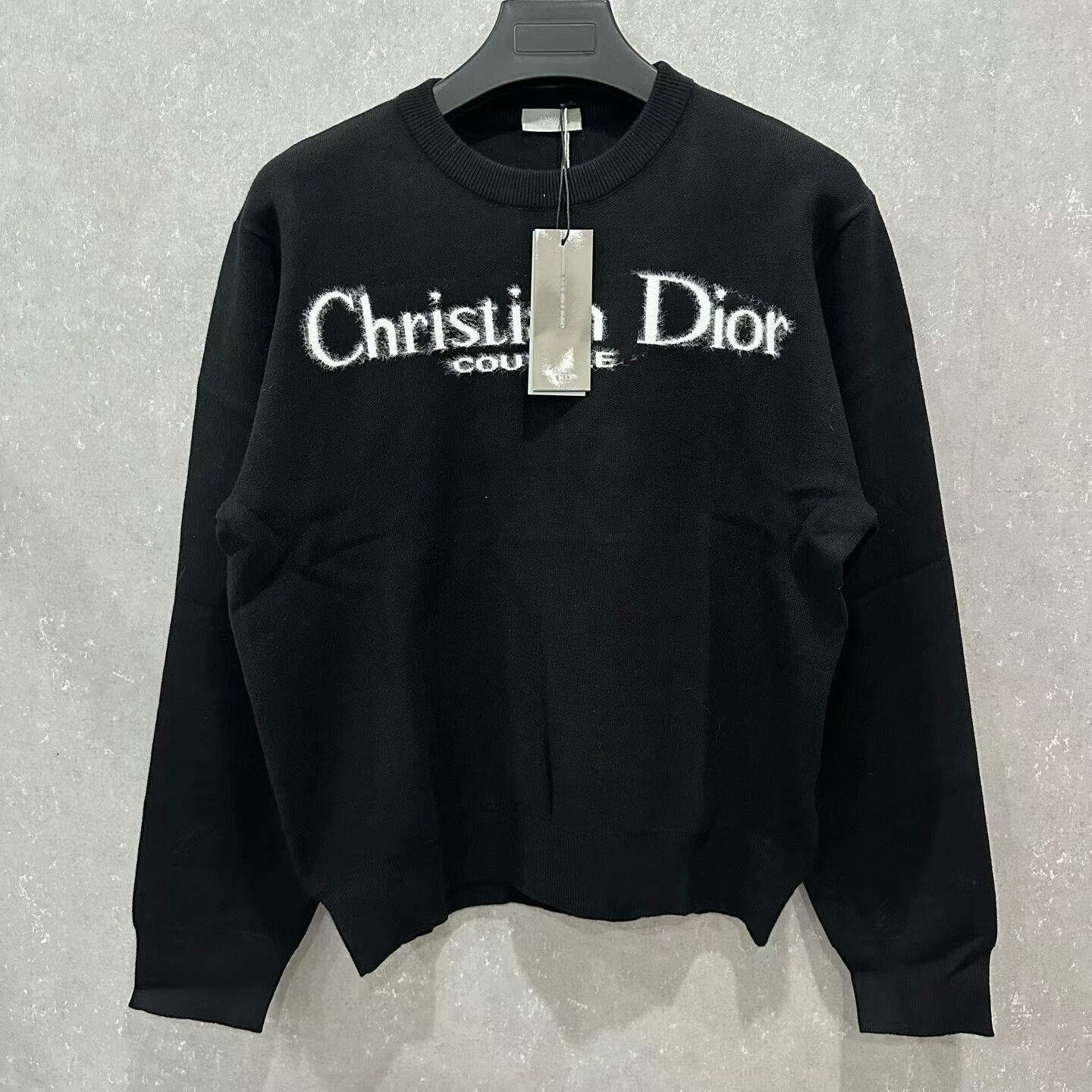 dior slogan print knitted sweater in size m