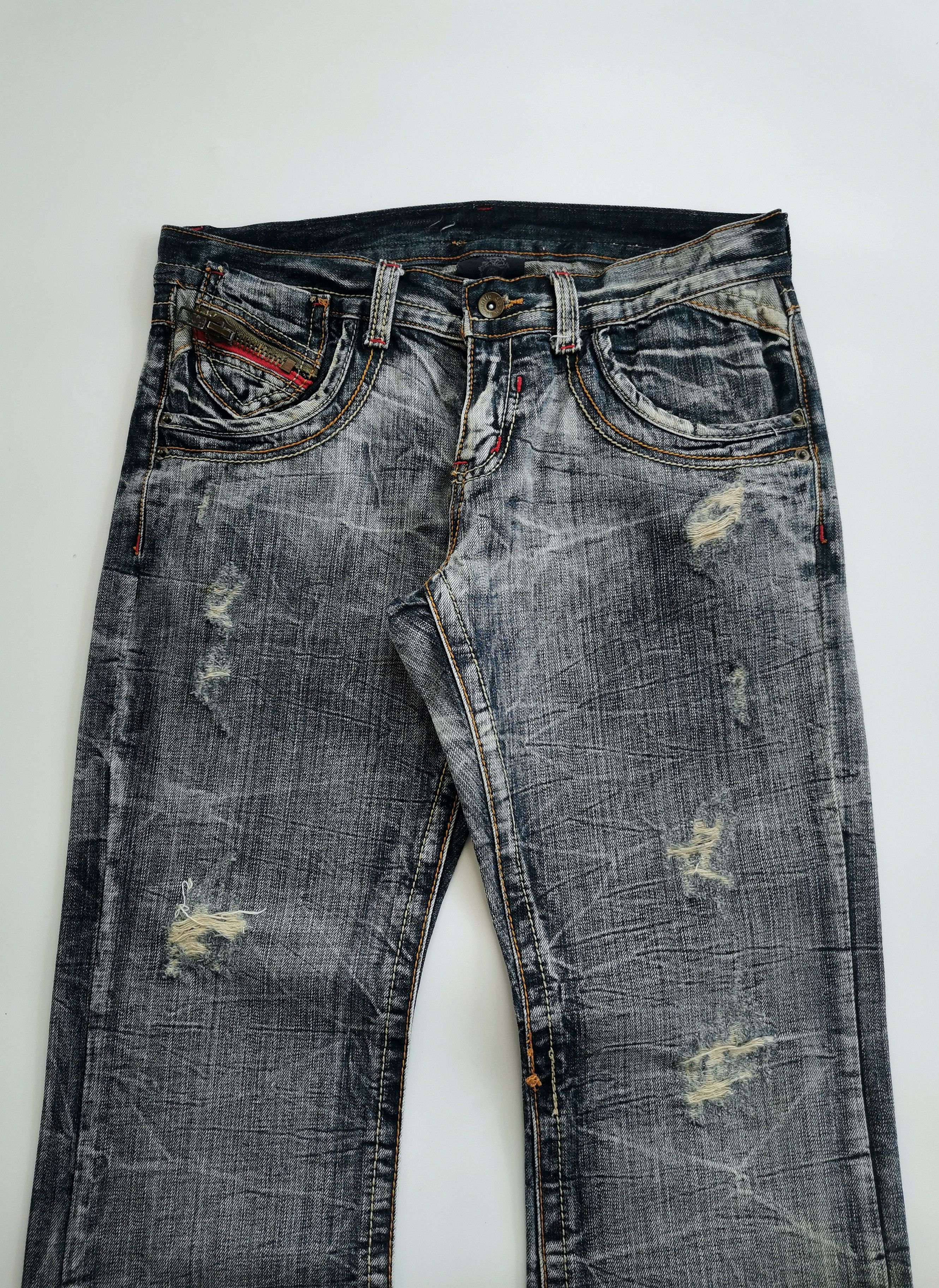 semanticdesign Semantic Design Tri-Zip Distressed Bootcut Flare