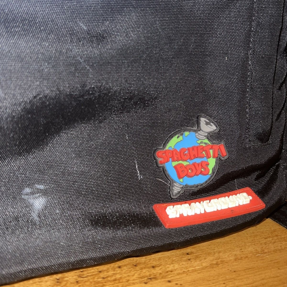 Spaghetti Boys × Sprayground Spaghetti boys spray ground screw the world bag Size ONE SIZE - 9 Thumbnail