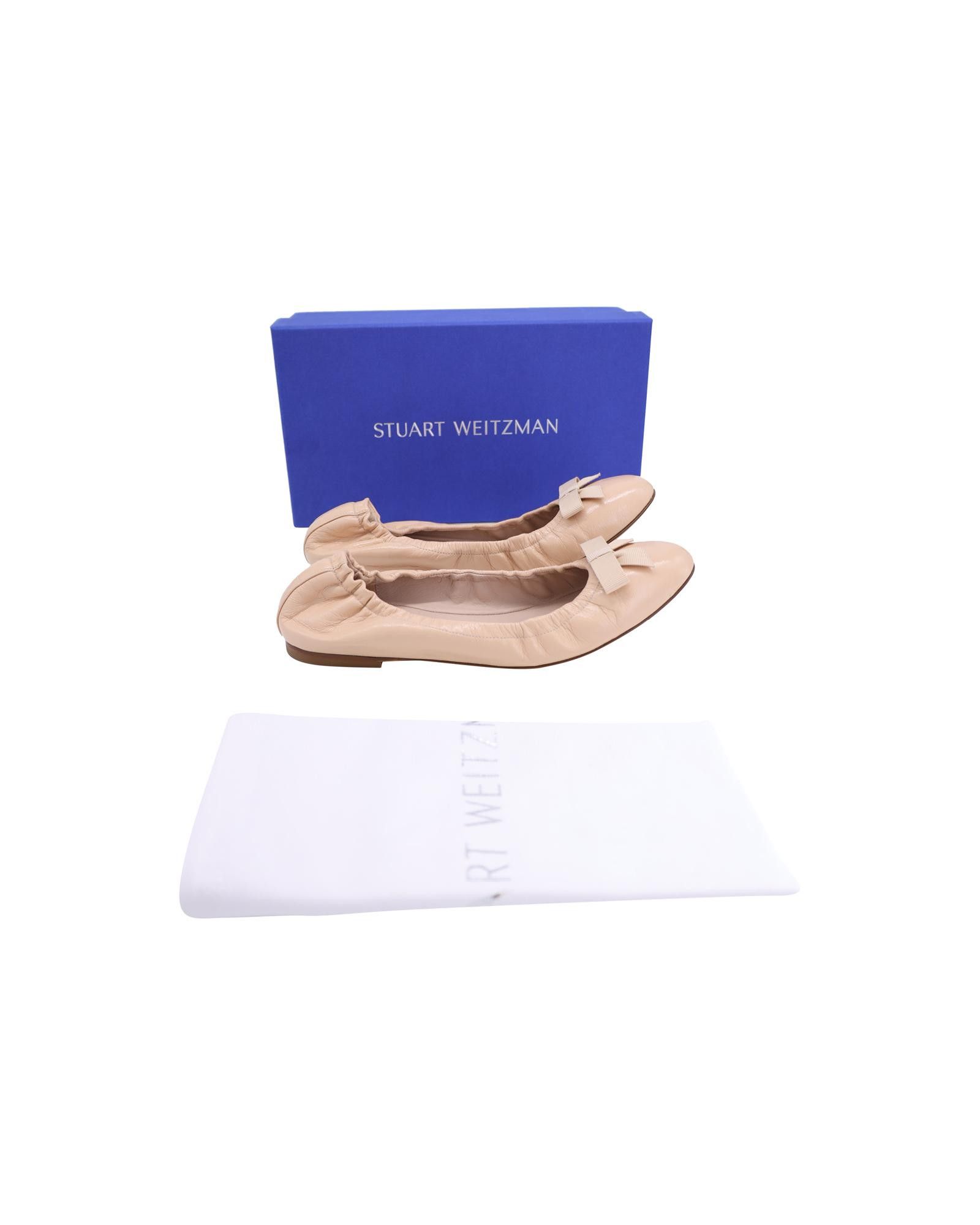 image of Stuart Weitzman Textured Leather Bow Ballet Flats With Round Toe And Scrunch Style in Beige, Women'