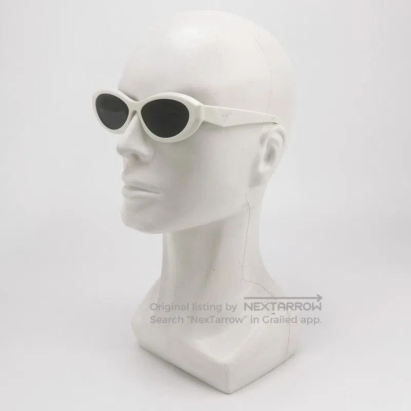 Prada Prada Logo Oval Frame Sunglasses in White. Size ONE SIZE - 1 Thumbnail