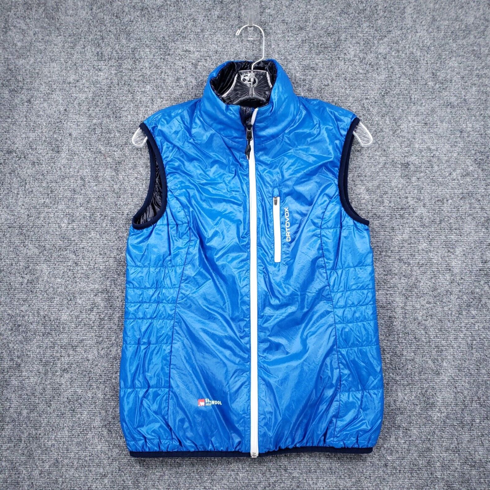 image of Ortovox Vest Women S Small Blue Swisswool Piz Grisch Reversible Full Zip Quilted in White
