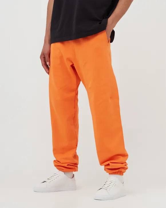 image of Calvin Klein Baggy Jogger Pants in Orange, Men's (Size 34)