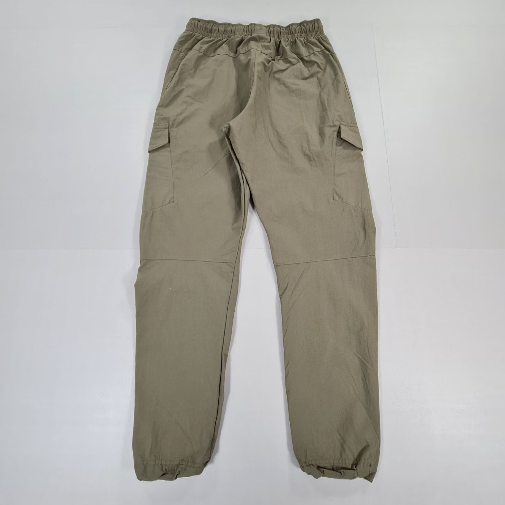Nike Nike Air Max Cargo Pants Mens Small Green Woven Joggers BV4923 325 Elastic Waist Pockets Zip Pocket Exercise Athletic Shirt? Size US 29 - 8 Thumbnail