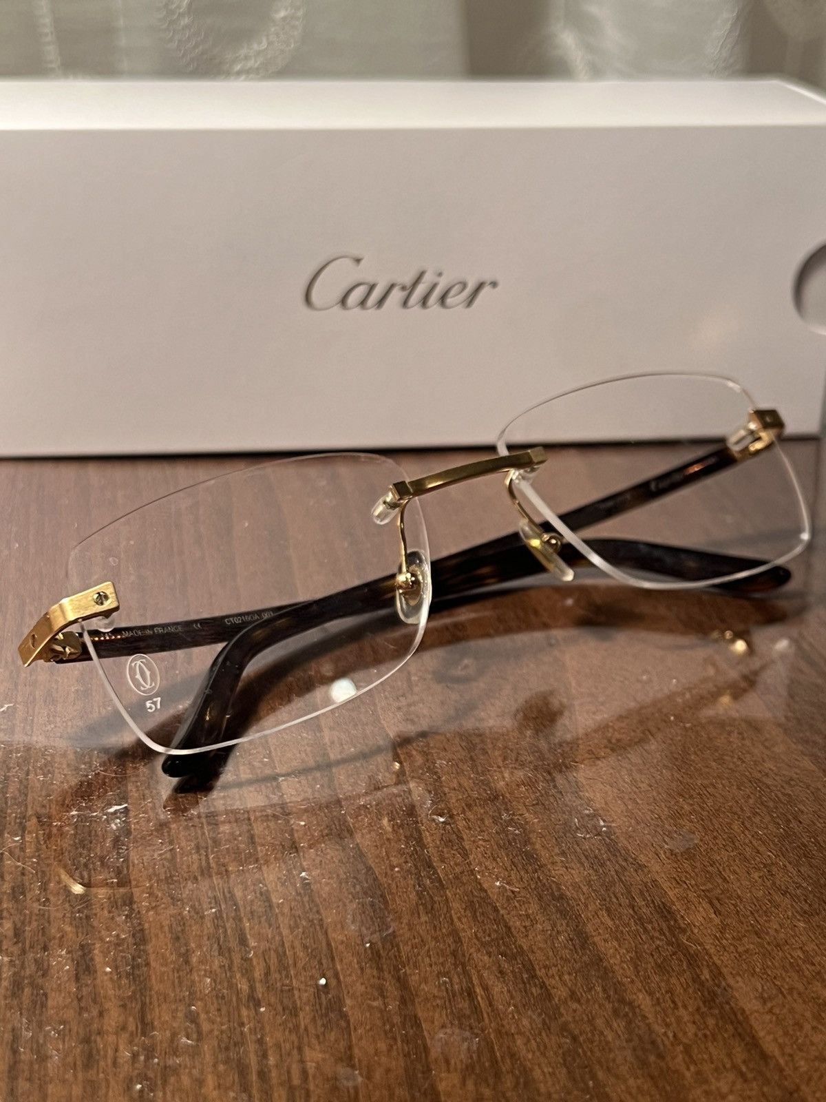 Cartier Frameless Cartier CT0216OA glasses Grailed