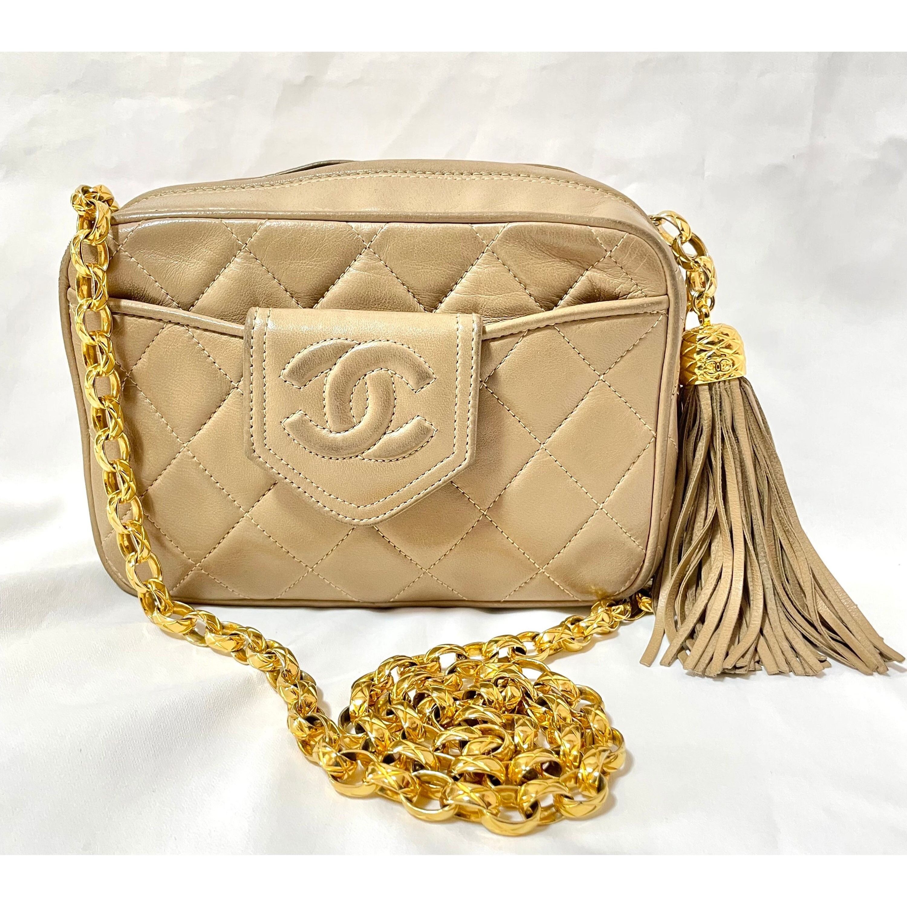 Vintage Chanel cocoa beige lambskin camera bag style bag.