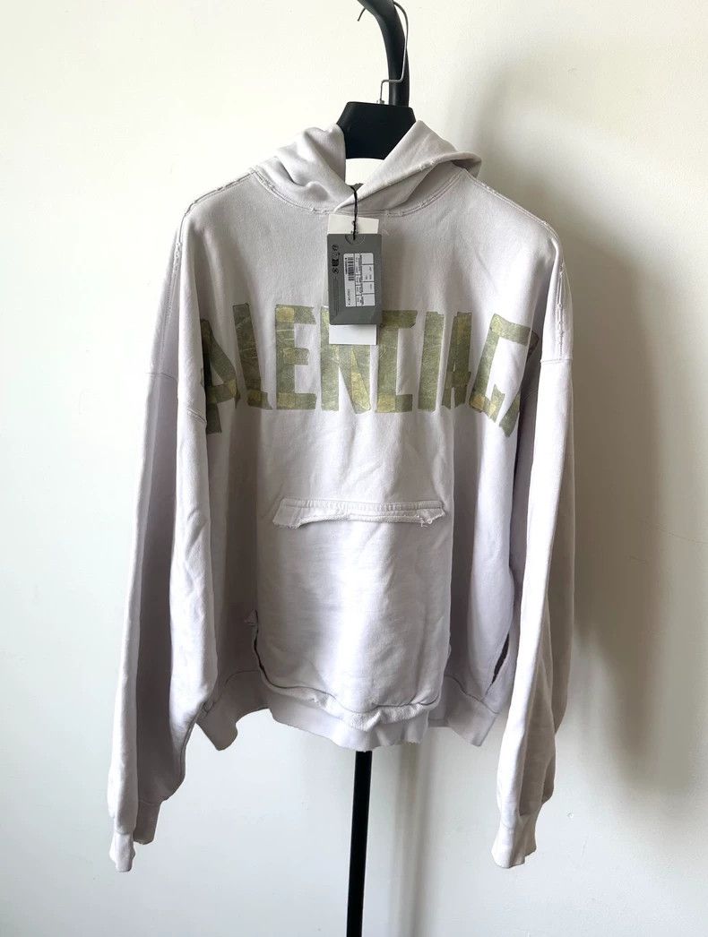 Balenciaga Ripped monogram printed hoodie