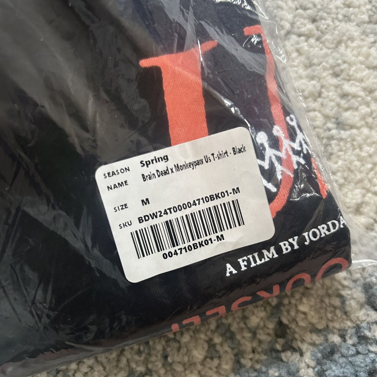 Brain Dead JORDAN PEELE US TEE MONKEYPAW PRODUCTiONS 5 YEAR ANNiVERSARY Size US M / EU 48-50 / 2 - 5 Thumbnail