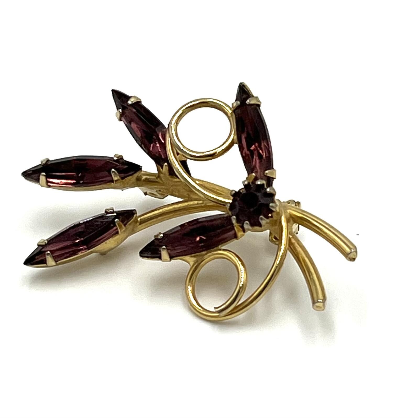 The Unbranded Brand Vintage GoldTone Brooch with Dark Purple Marquise Rhinestone Size ONE SIZE - 1 Thumbnail