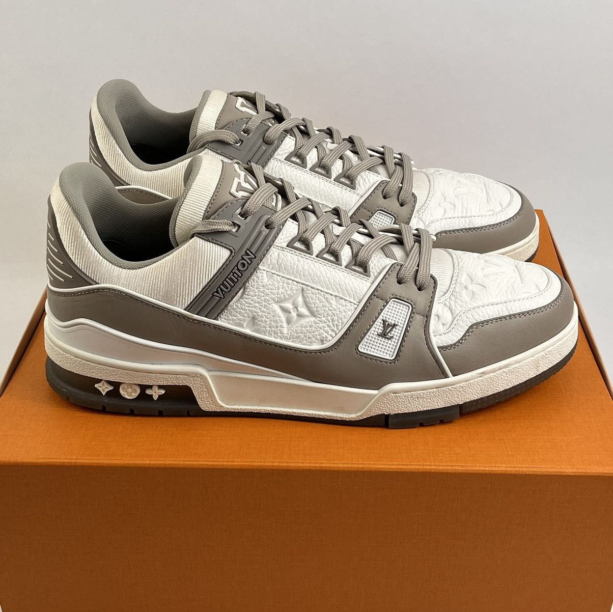 image of Louis Vuitton Logo Embossed Sneakers in Grey White, Men's (Size 12)