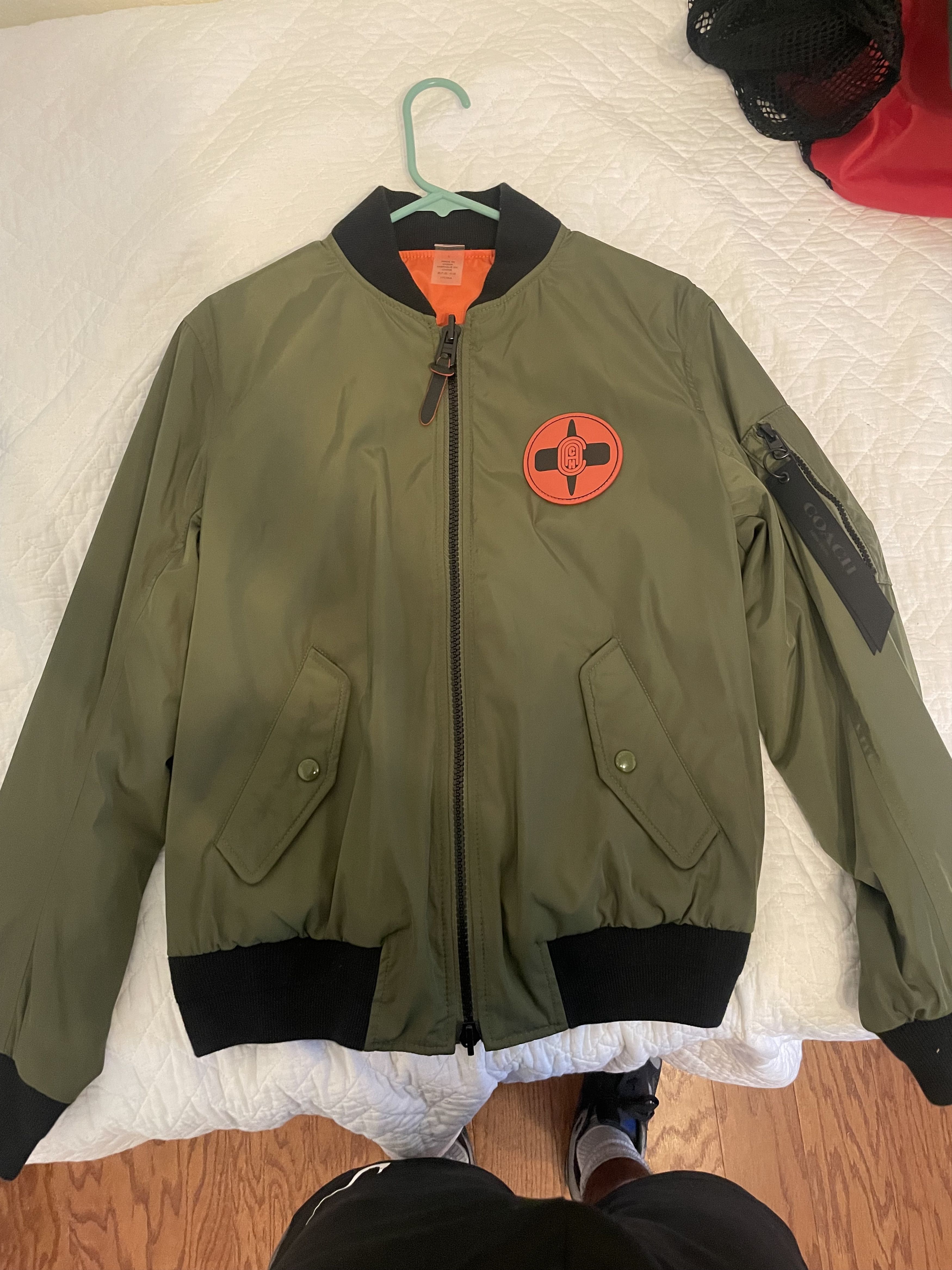 ナルト　coach ジャケット COACH、アニメ「NARUTO ‐ナルト‐ 疾風伝」にインスパイアした「COACH X