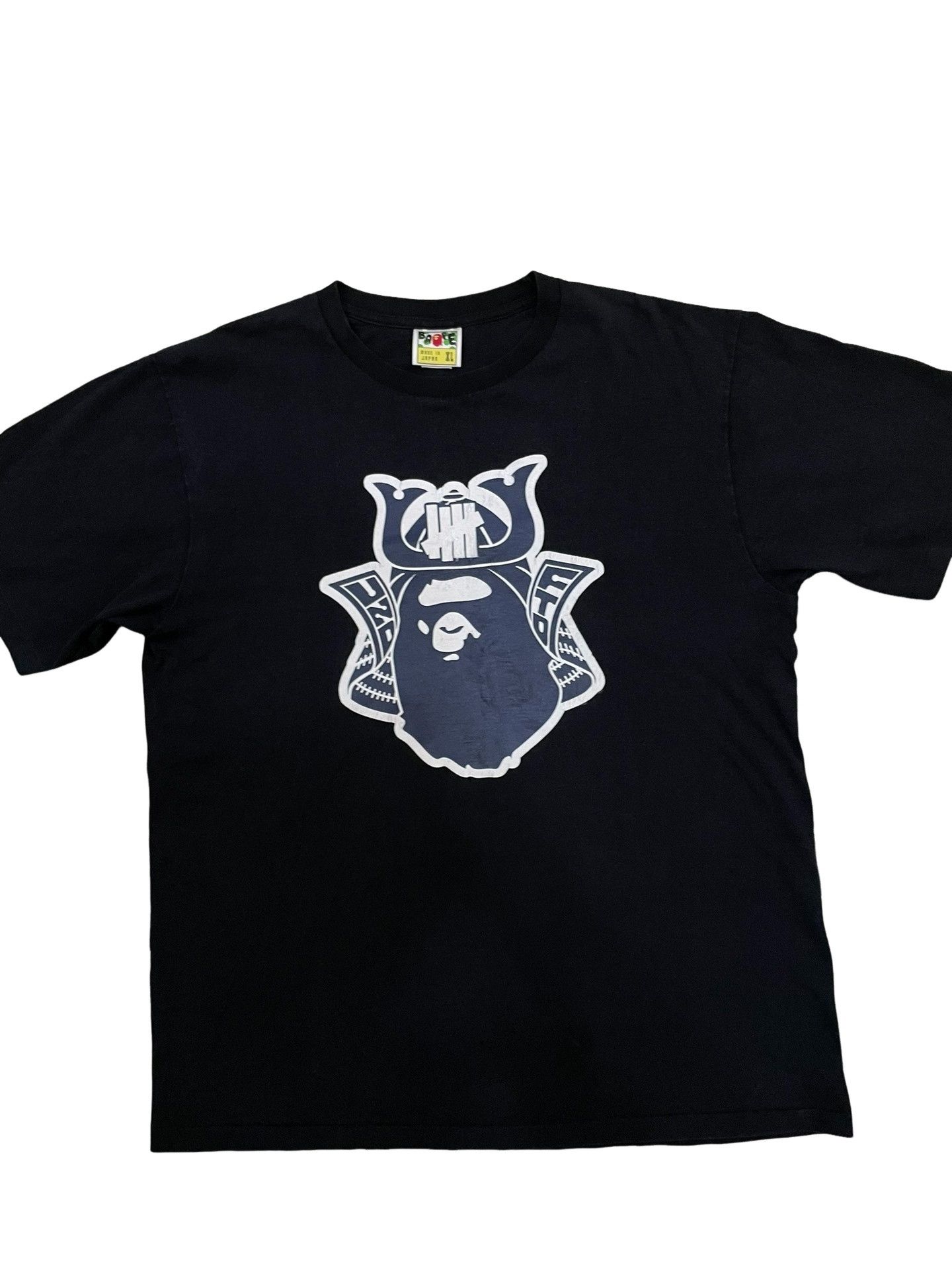 Bape A Bathing Ape x Undefeated Graphic T-Shirt XL Size US XL / EU 56 / 4 - 1 Thumbnail