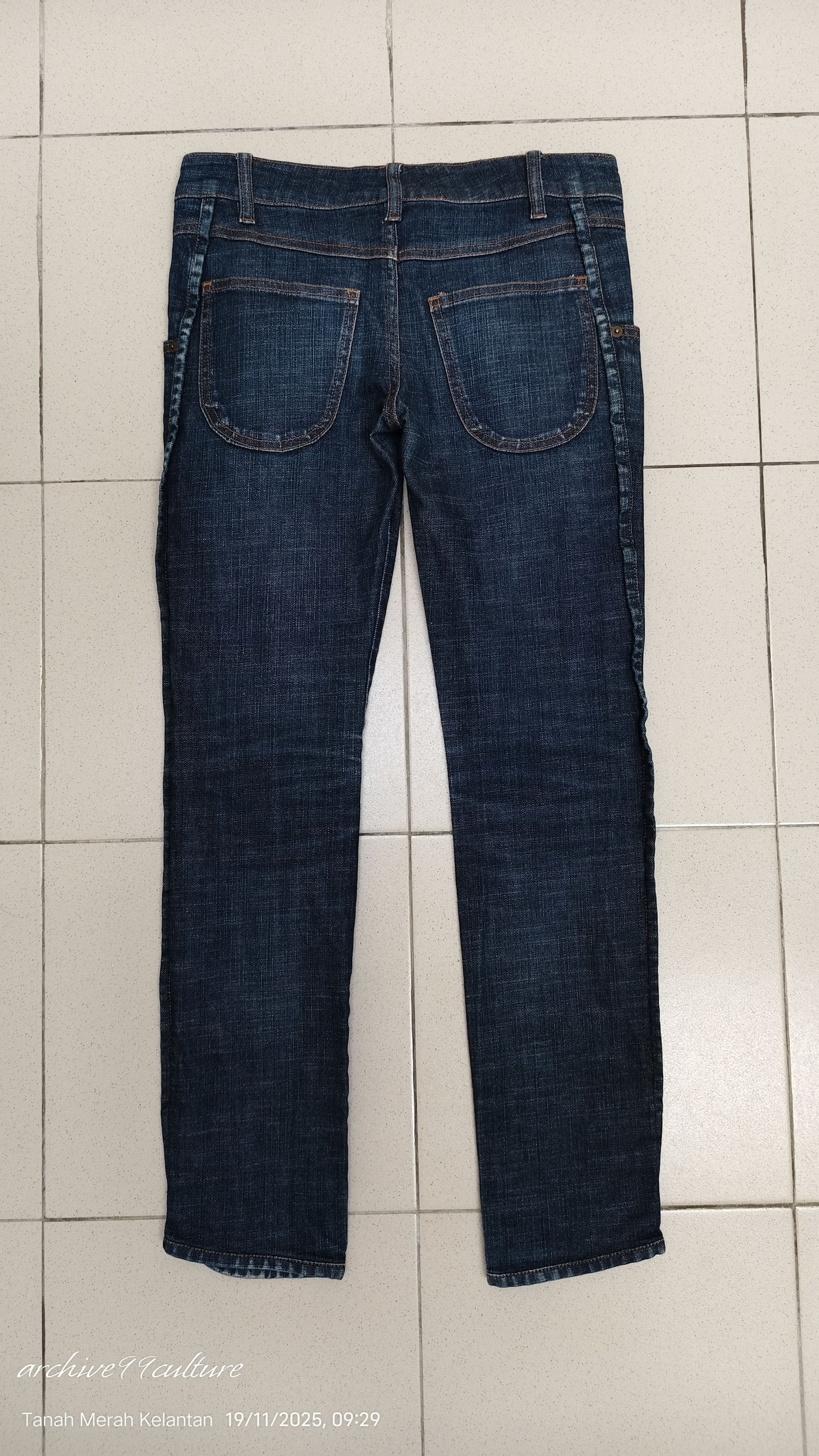 Tsumori Chisato Dark wash jeans with a lowrise fit and buttoned ankle cuffs Size 29" - 2 Thumbnail