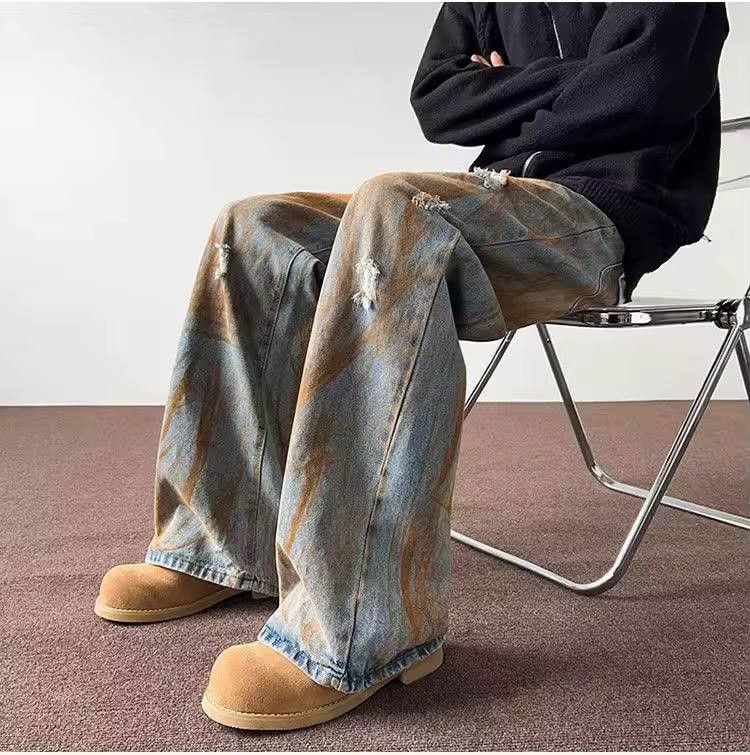 ripped casual jeans in a rust color.