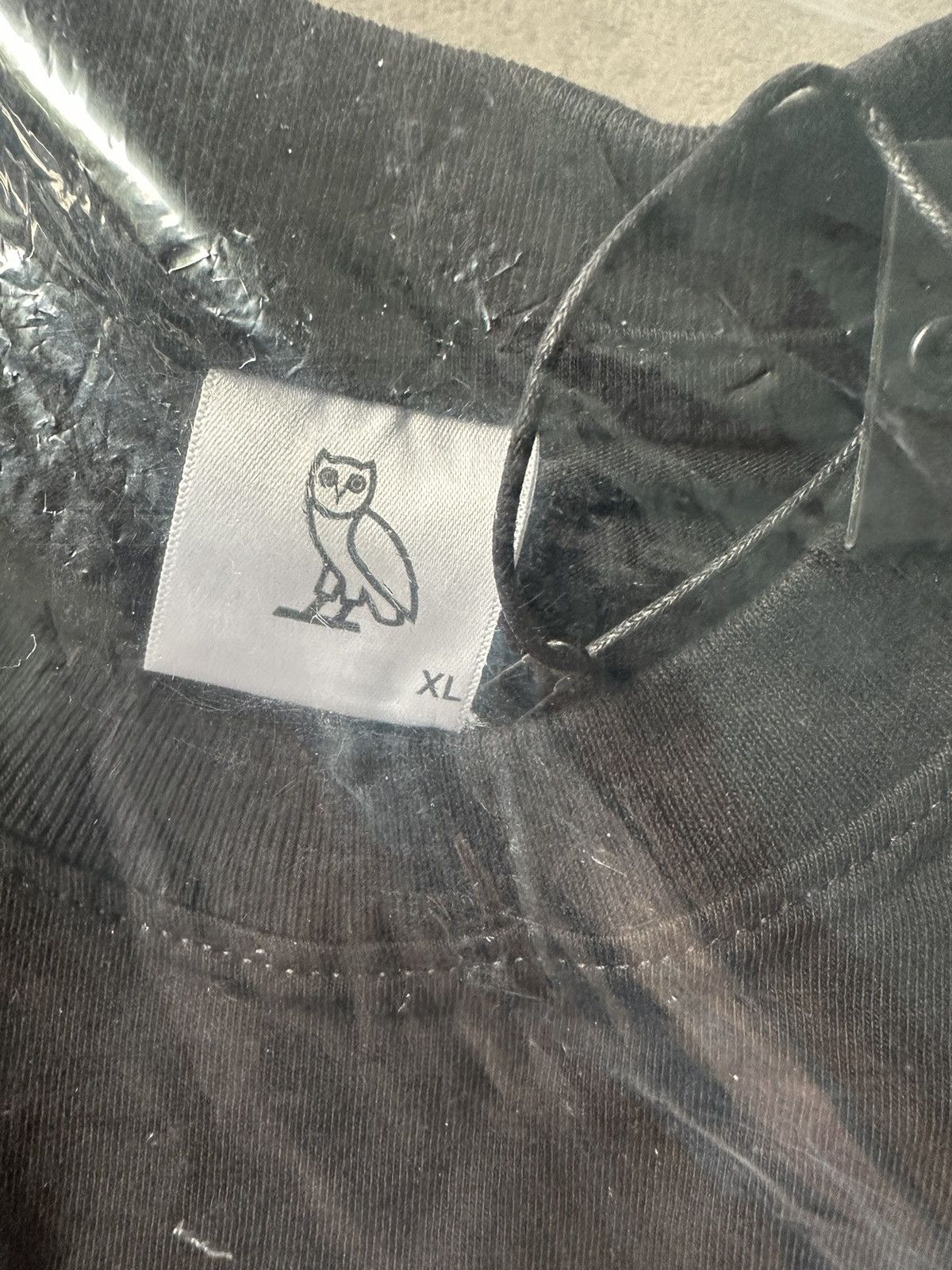 Drake × October's Very Own OVO Echo Owl Arabic T-Shirt - Brand new with tags (rare) Size US XL / EU 56 / 4 - 7 Thumbnail