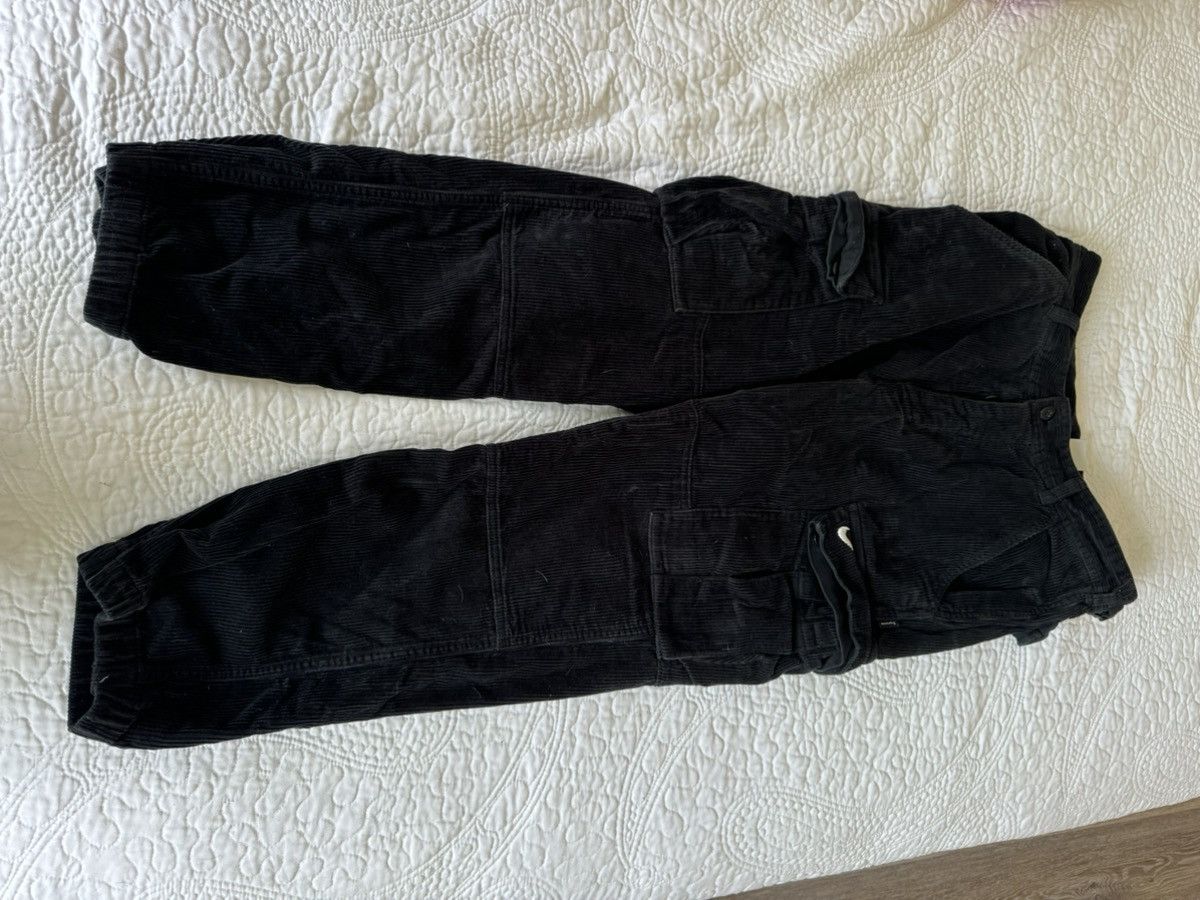 Image of Nike Supreme Arc Corduroy Cargo Pants in Black, Men's (Size 30)