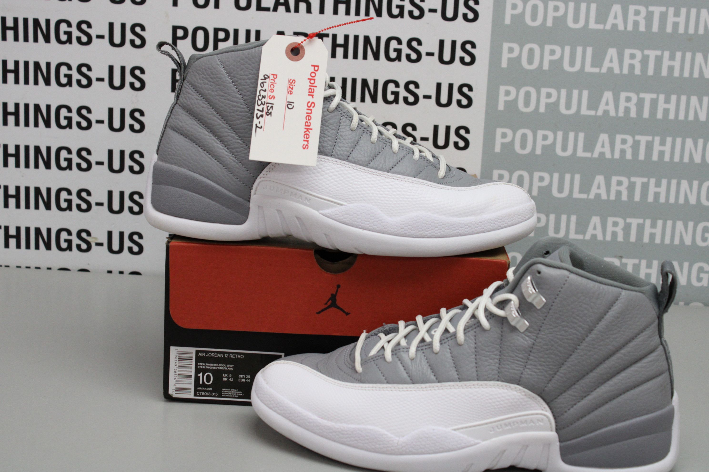 image of Air Jordan 12 Retro Stealth Size 10 Shoes in Grey White, Men's