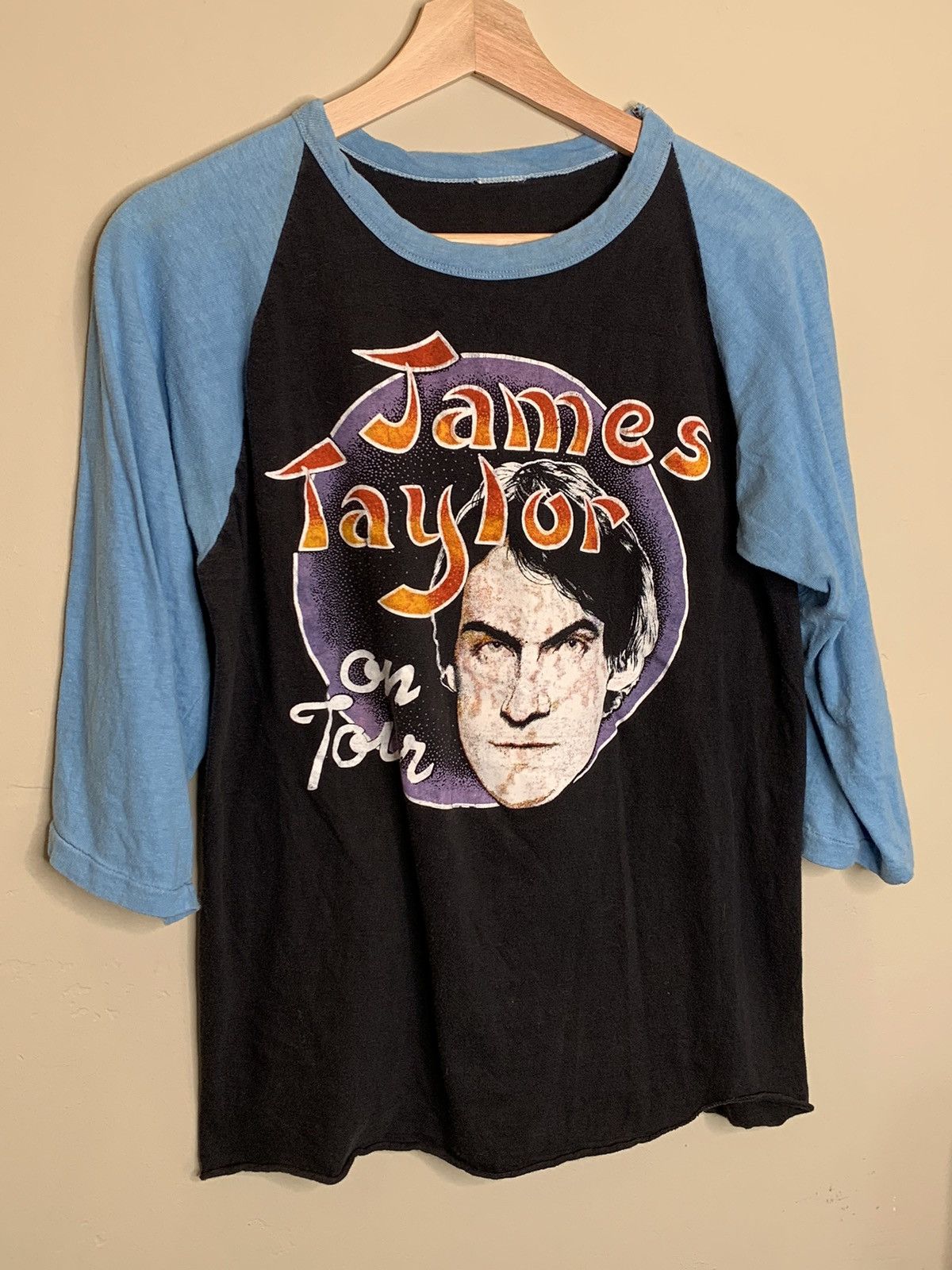 image of Art x Band Tees Vintage 1981 James Taylor Daddy Loves His Work Raglan in Black/Blue (Size Medium)