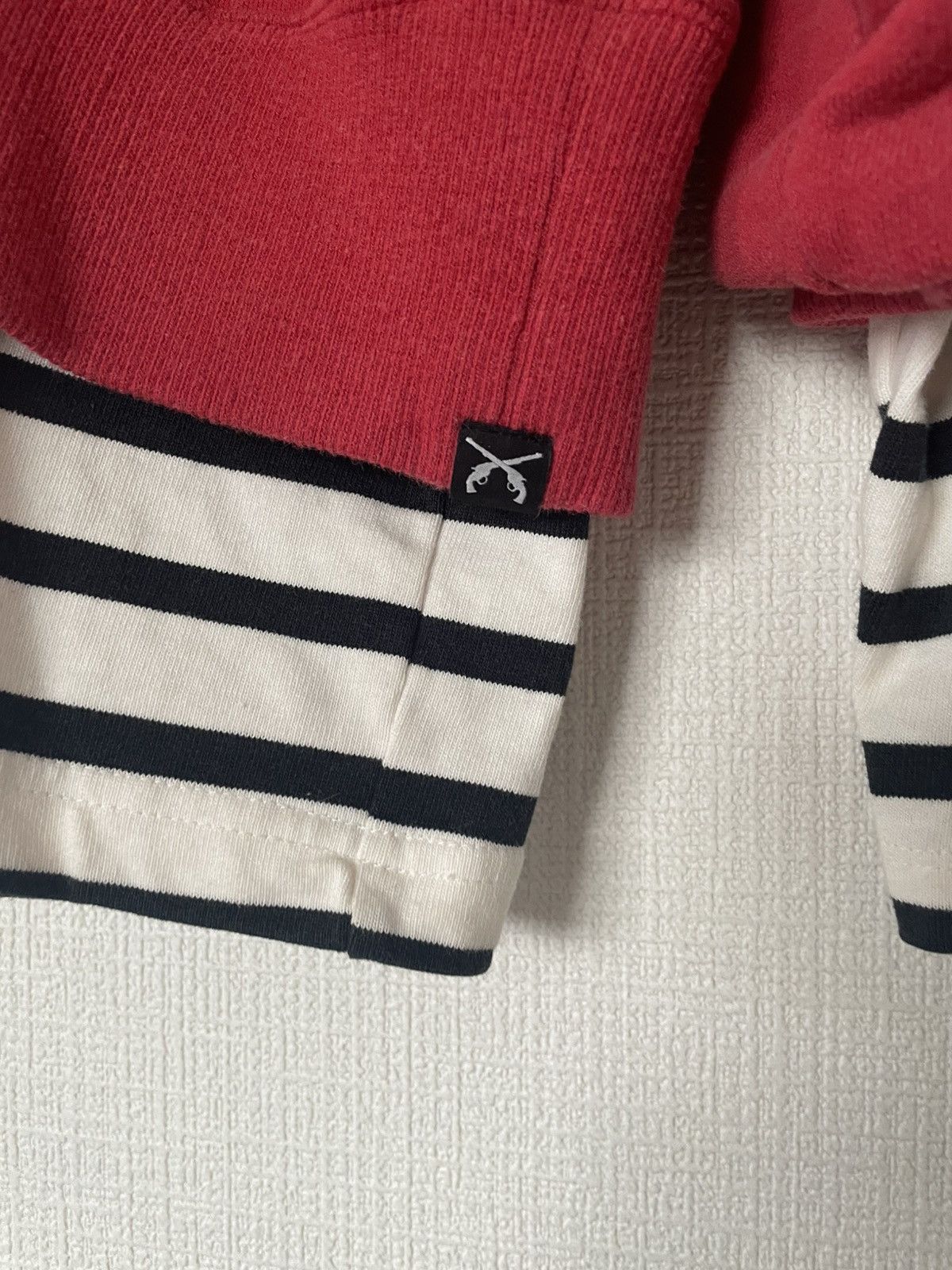 Roar 2000s roar guns distressed red& striped layerling Size US M / EU 48-50 / 2 - 4 Thumbnail