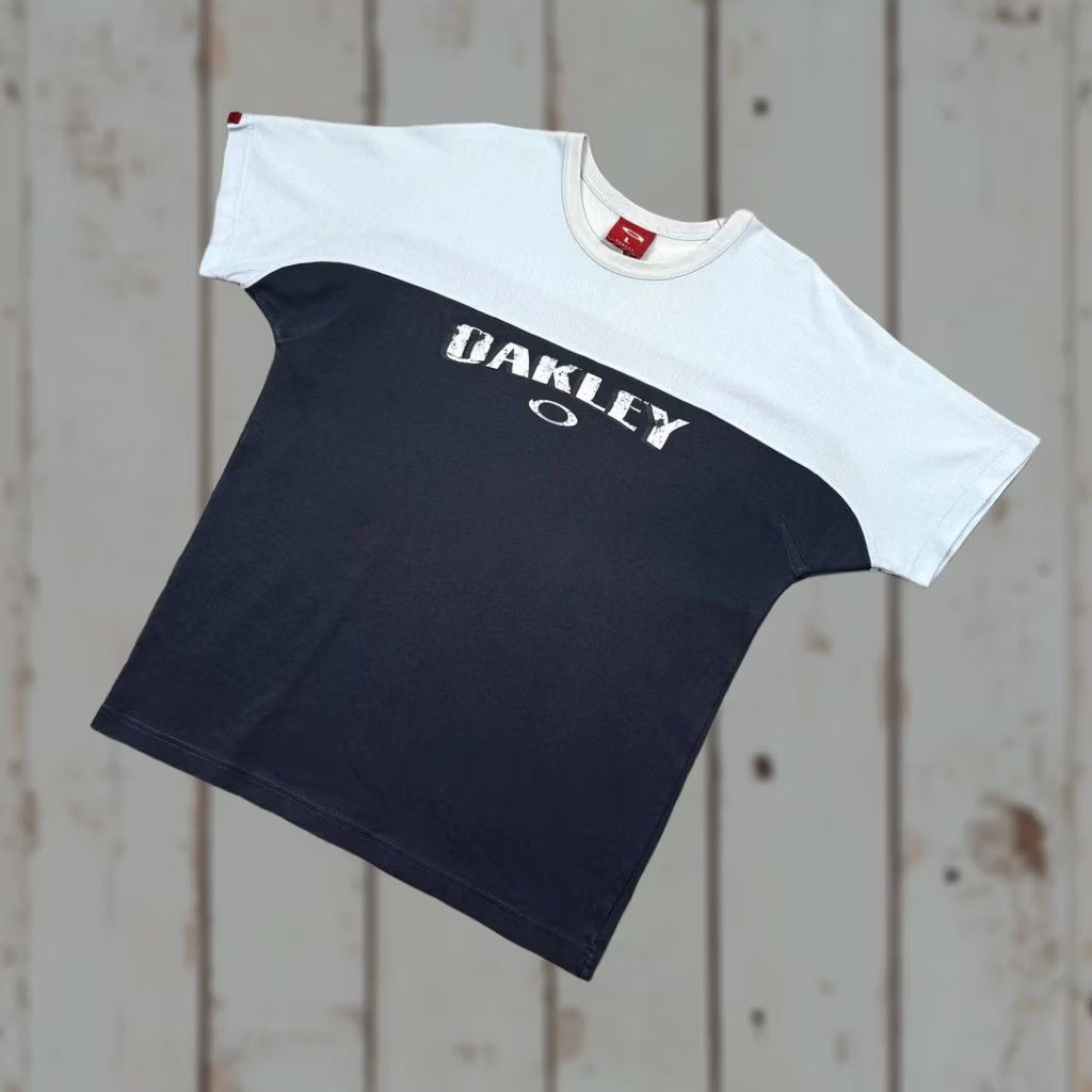 00s OAKLEY Tシャツ Oakley × Vintage ☠️ OAKLEY 00s Squid Rare Big Logo Vintage T