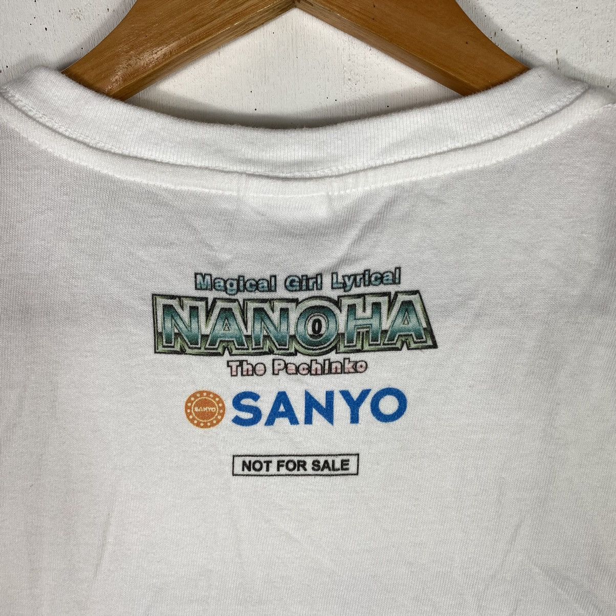 Anime × Japanese Brand × Vintage MAGICAL GIRL LYRICAL NANOHA THE PACHINKO ANIME MOVIE TEE Size US L / EU 52-54 / 3 - 9 Thumbnail
