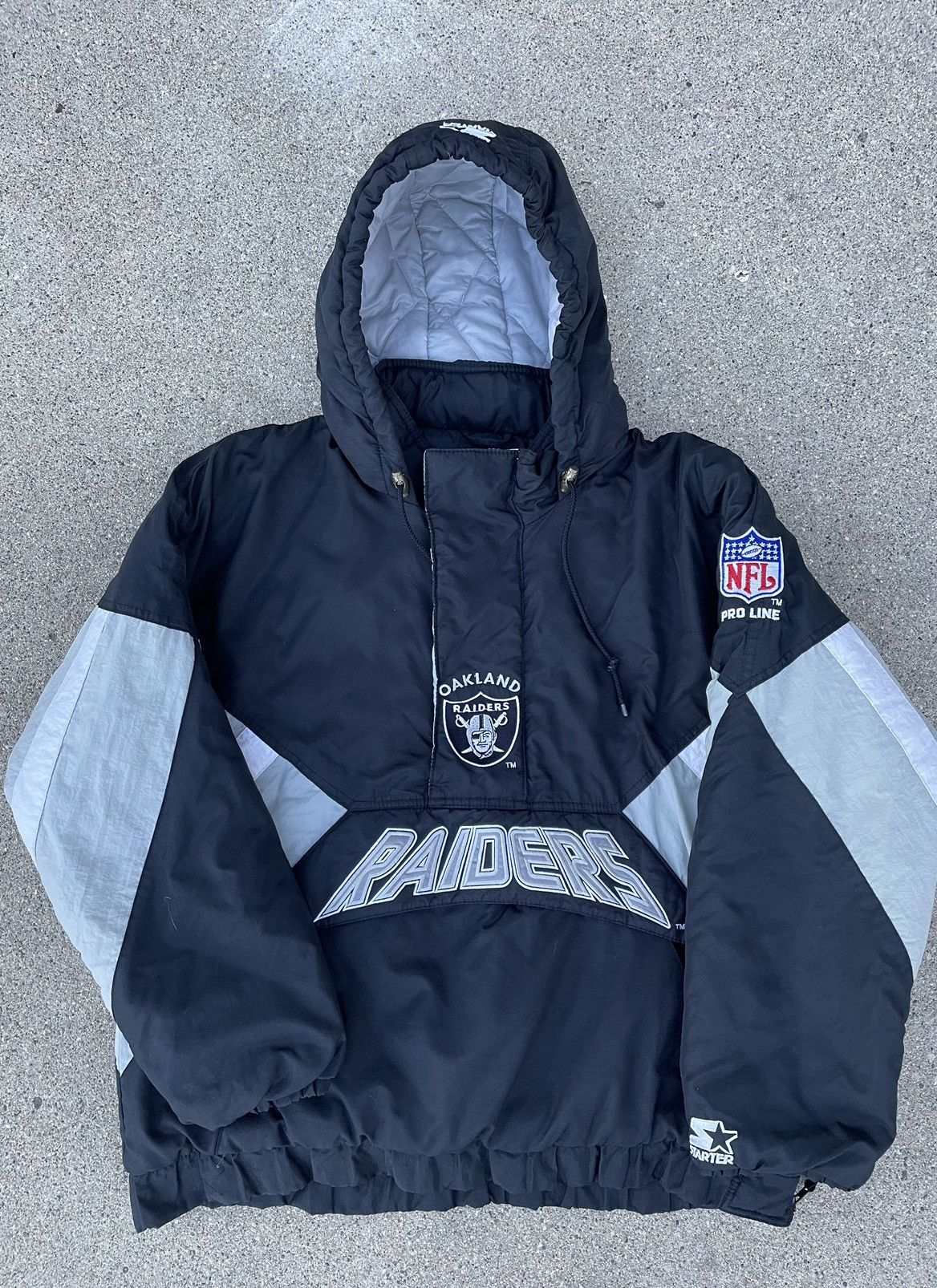 image of Vintage Oakland Raiders Puffer Jacket in Black, Men's (Size Large)