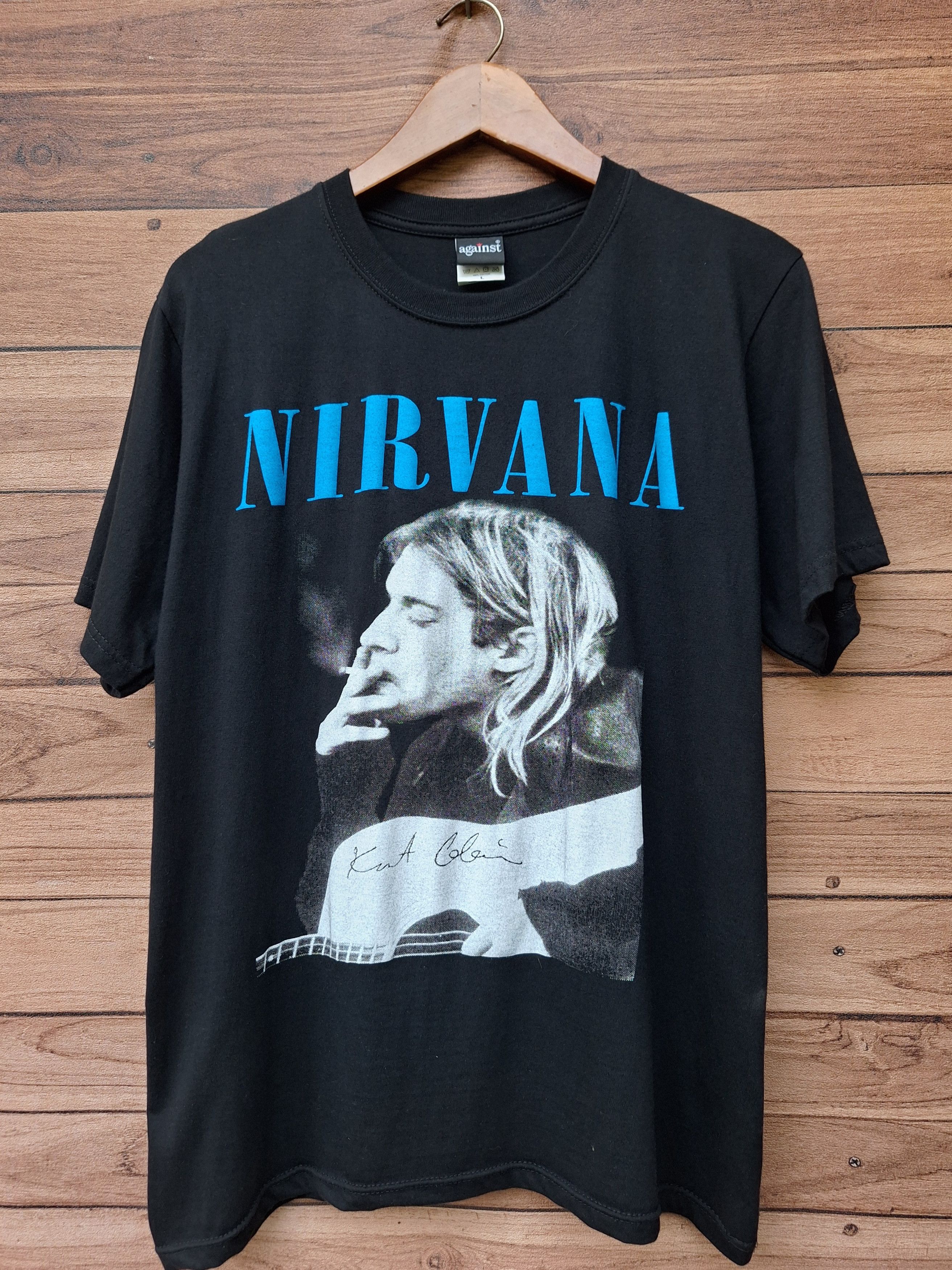 Japanese Brand 🔥RARE🔥Nirvana smiley Kurt Cobain not nevermind album tee Size US L / EU 52-54 / 3 - 1 Thumbnail