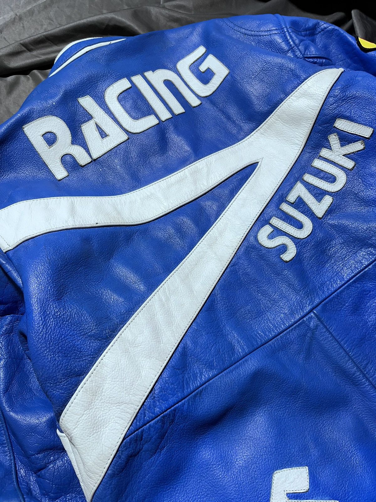 Japanese Brand Vintage Suzuki racing MOTO suit big multi Logo real leather Size US XL / EU 56 / 4 - 19 Thumbnail